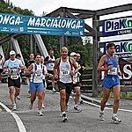 Crossing the Avisio river on the Forno bridge   - Competitors leave Val di Fassa towards Val di Fiemme 